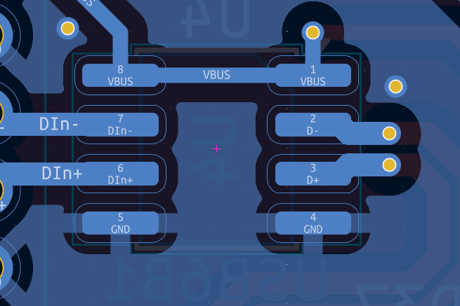 An IC and the traces connected to it, carved out of the ground plane